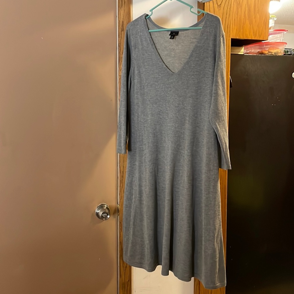 Woman’s grey dress.